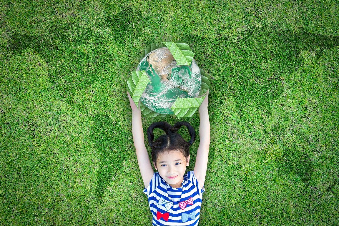 What Nordmann will do in regard of sustainability until 2024 Girl on a meadow
