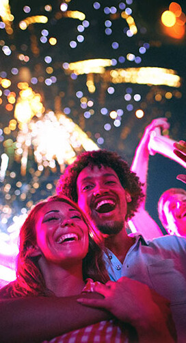 Since 2001 Nordmann has grown constantly Happy people celebrating with fireworks