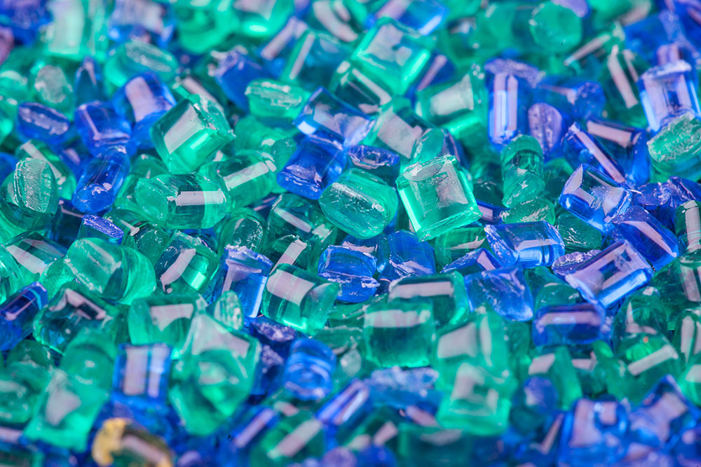 Plastic flakes in blue and green