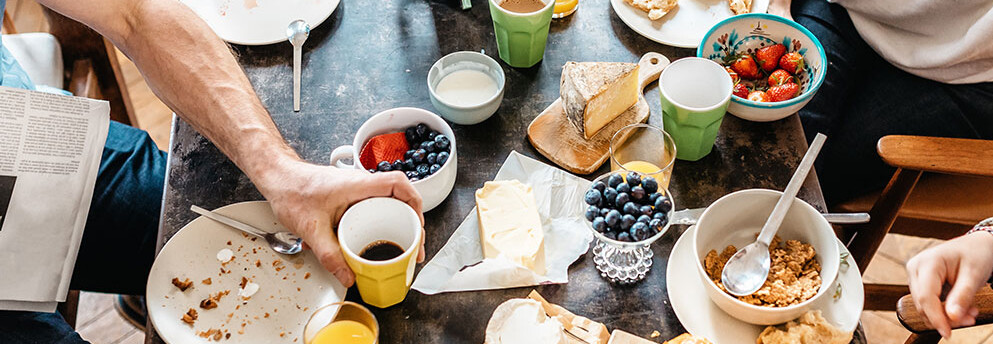 Food on a breakfast table, dairies, coffee, muesli,